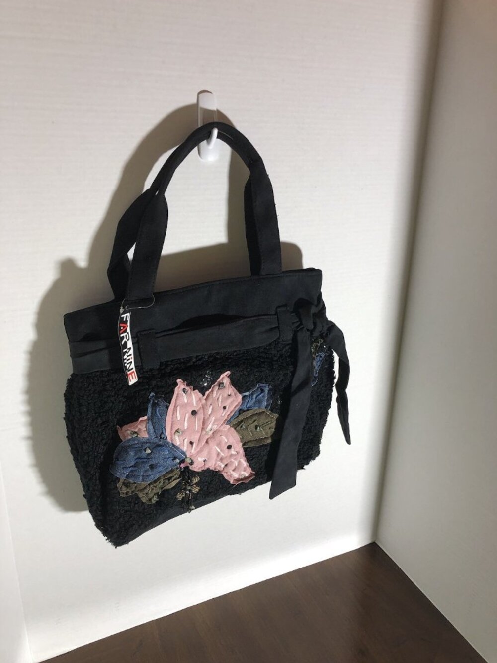 Far Nine Tote In Black With Flower 14” x 12” x4”